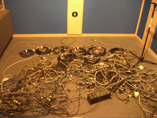 Photo pile of cables during deconstruction old studio